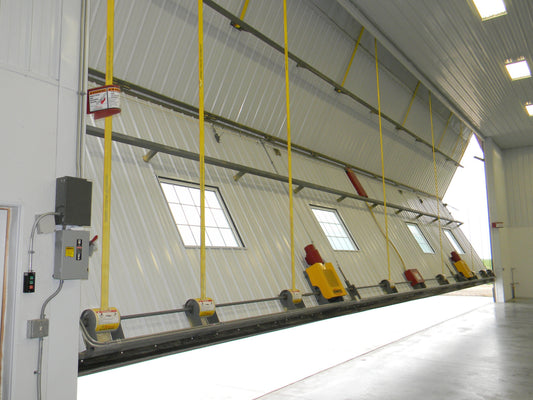 The Role of Hinges and Bearings in Hangar Door Performance